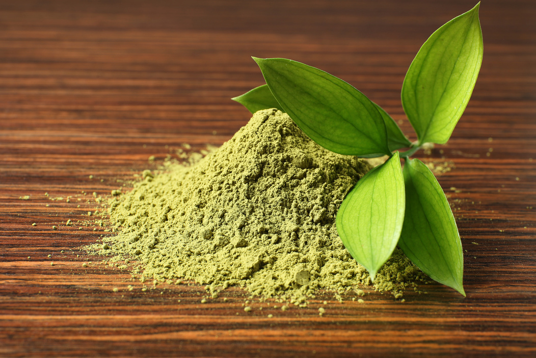 Powdered Matcha Green Tea on Wooden Table